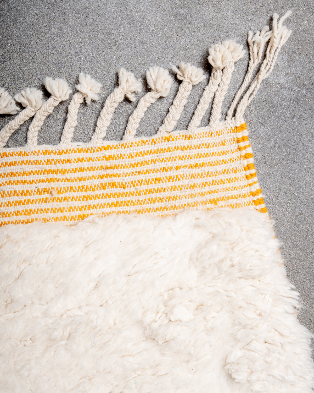 Modern, designer, handcrafted Berber rug from Morocco. Beniourain carpet with beautiful colours and patterns and fluffy wool texture.